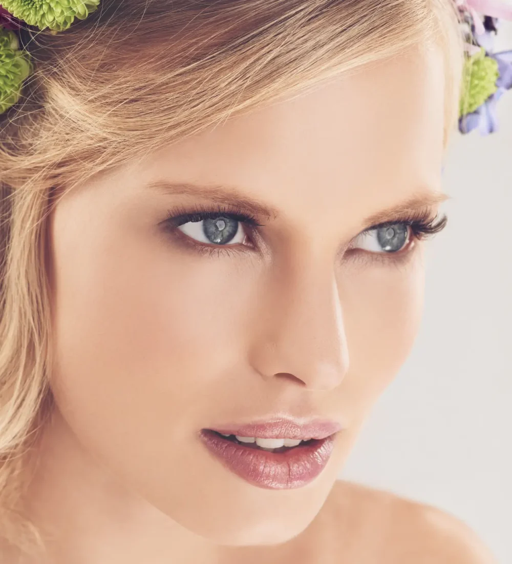 woman-face-flowers-crown-studio-with-makeup-confidence-cosmetics-beauty-skincare-spring-aesthetic-model-floral-headband-with-glowing-skin-wellness-white-background